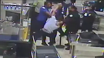 Wild video shows man attacking TSA agent at Miami International Airport